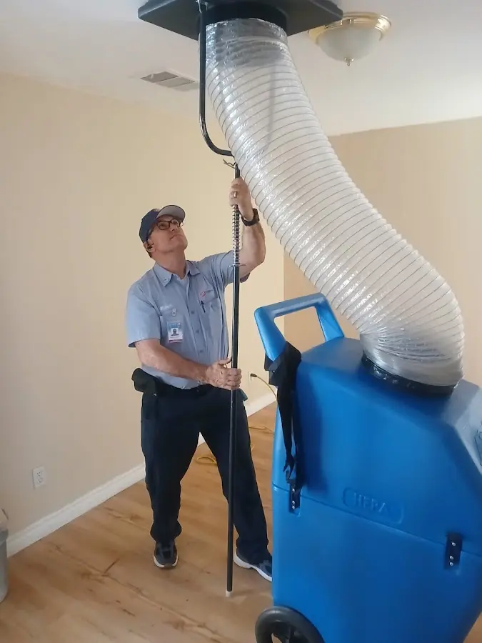 HVAC Installation technician using HEPA equipment in Westlake